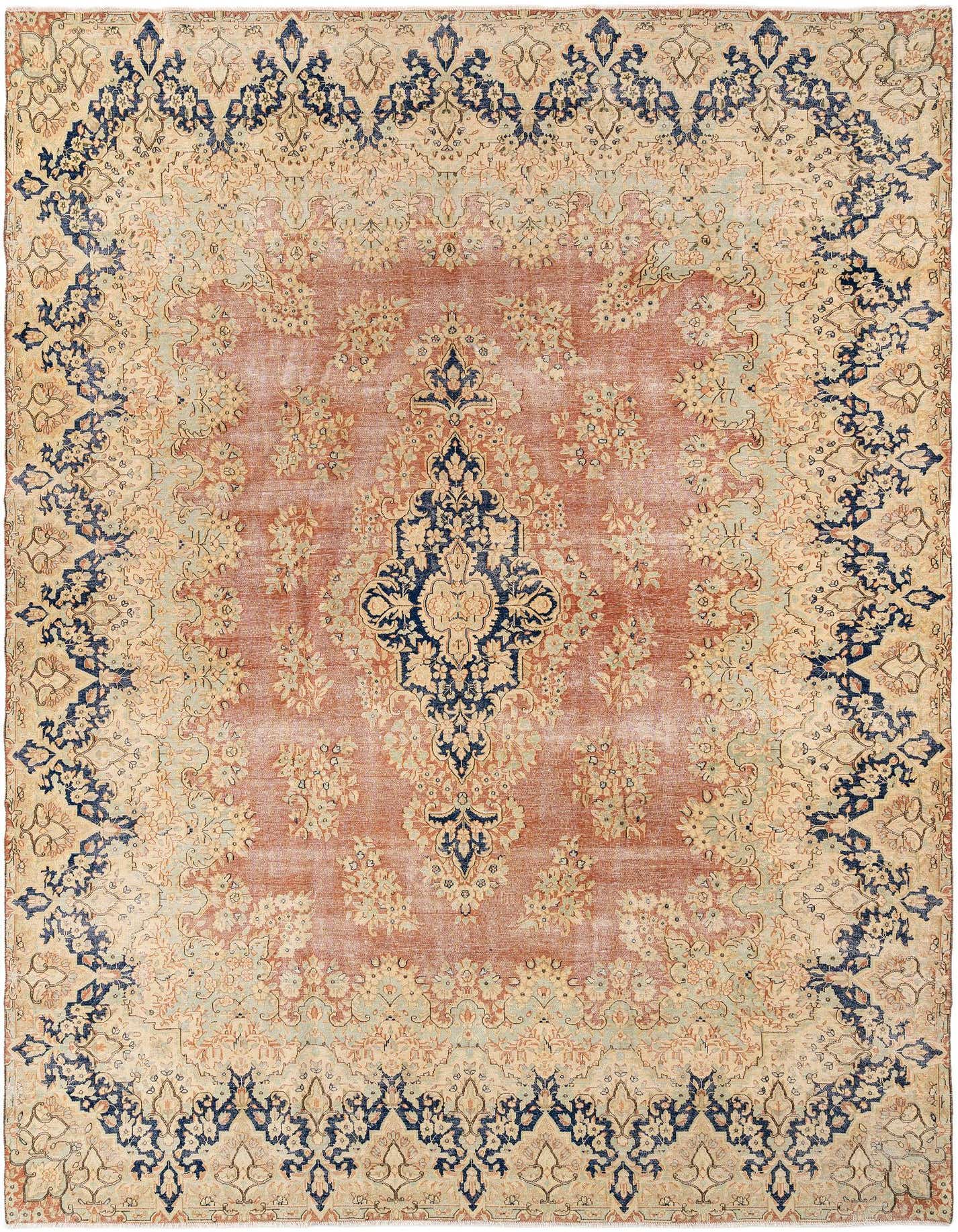 A large 10x13 rectangular Vintage Royal rug with a faded pink center and ornate navy and cream traditional patterns.