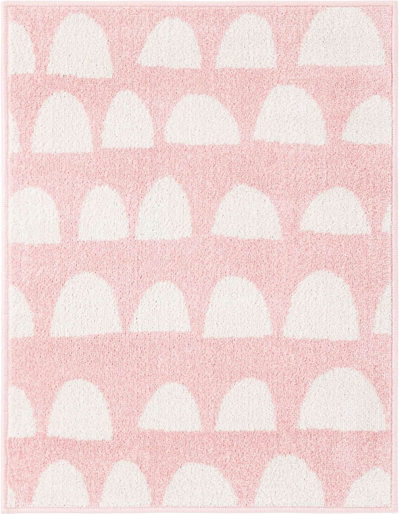 A 2x3 rectangular pink rug with a modern abstract pattern of white half-circle shapes, perfect for a kids' room.