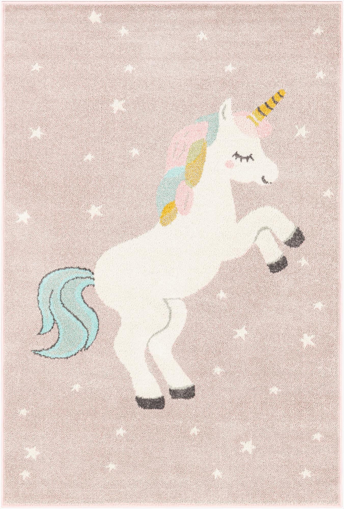 A 4x6 rectangular pink kids' rug featuring a large white unicorn with a colorful mane and tail, surrounded by small white stars.