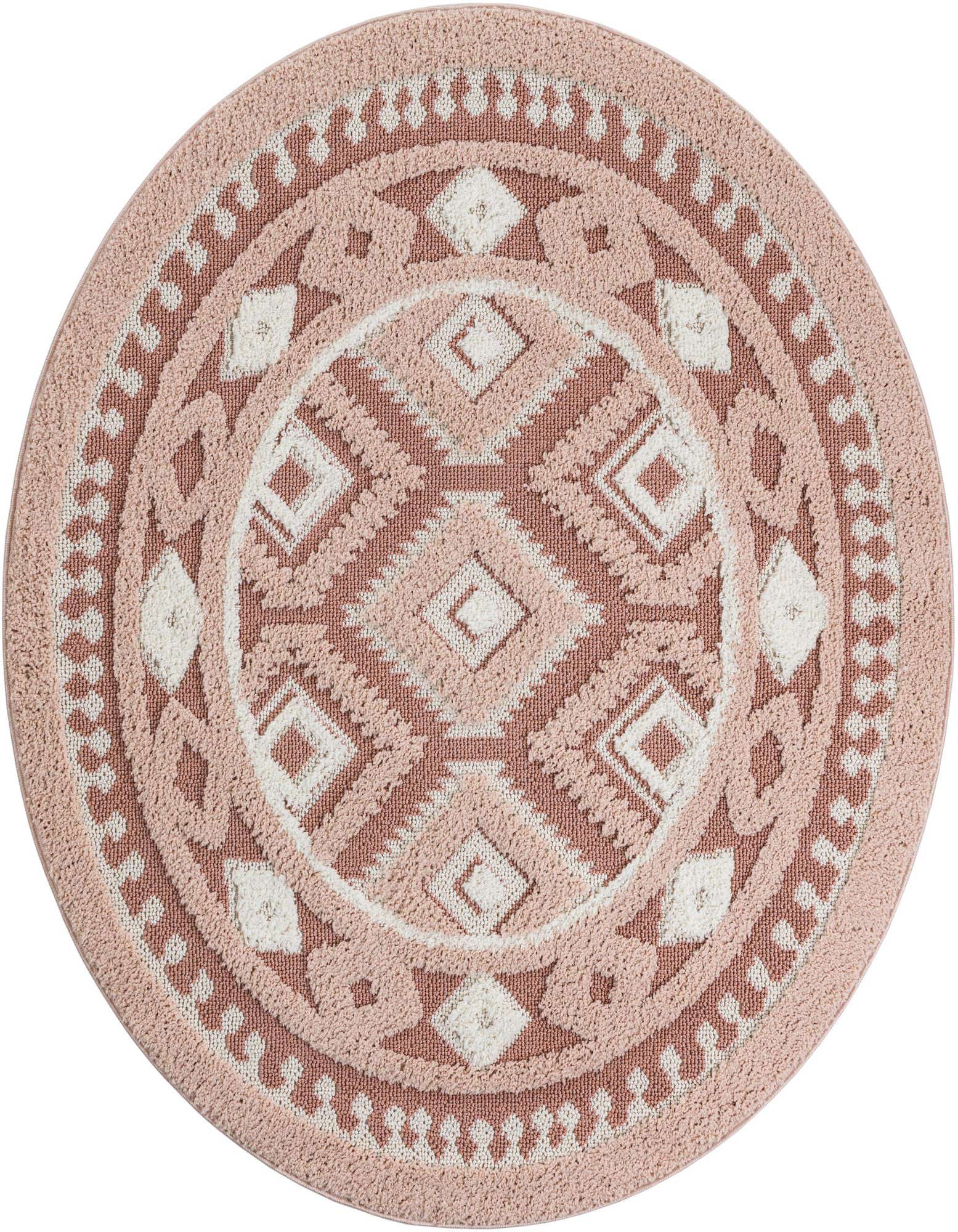 A 5' 3 round pink and off-white Southwestern rug with a geometric tribal pattern, featuring a textured pile.