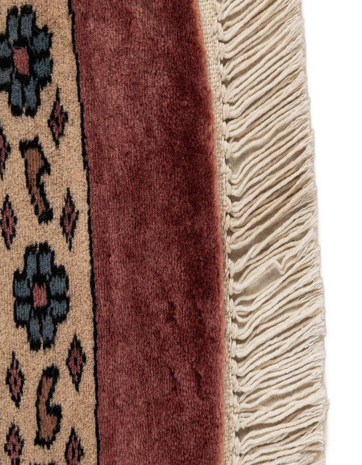 Detail image of  5' 11 x 6'  Hand Knotted Bokhara Oriental Wool Round Rug