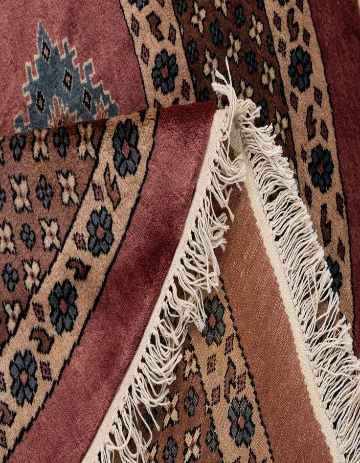 Detail image of  5' 11 x 6'  Hand Knotted Bokhara Oriental Wool Round Rug