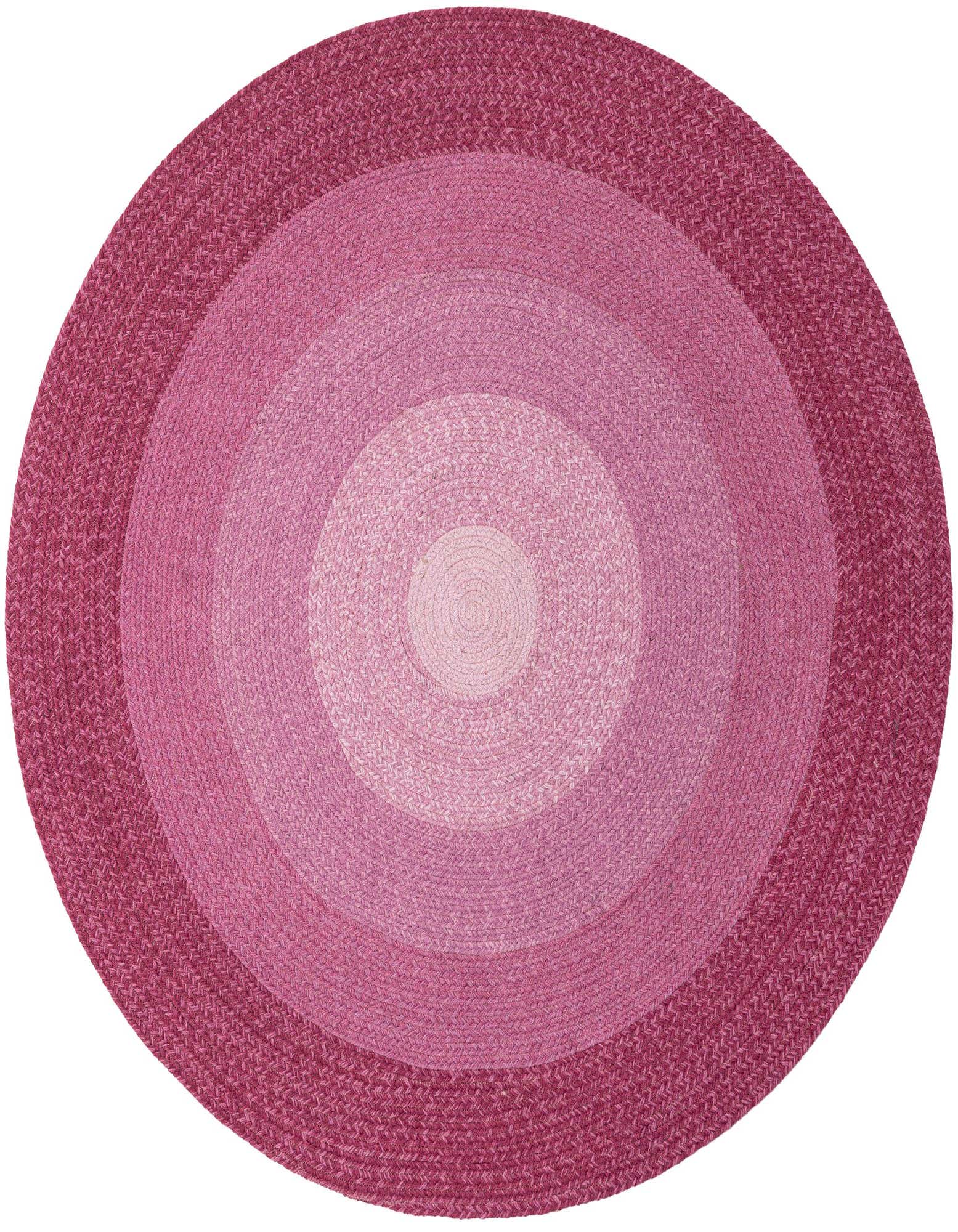 A 5' 1 round pink wool rug with concentric circles of varying pink shades, from light to dark, in a braided texture.