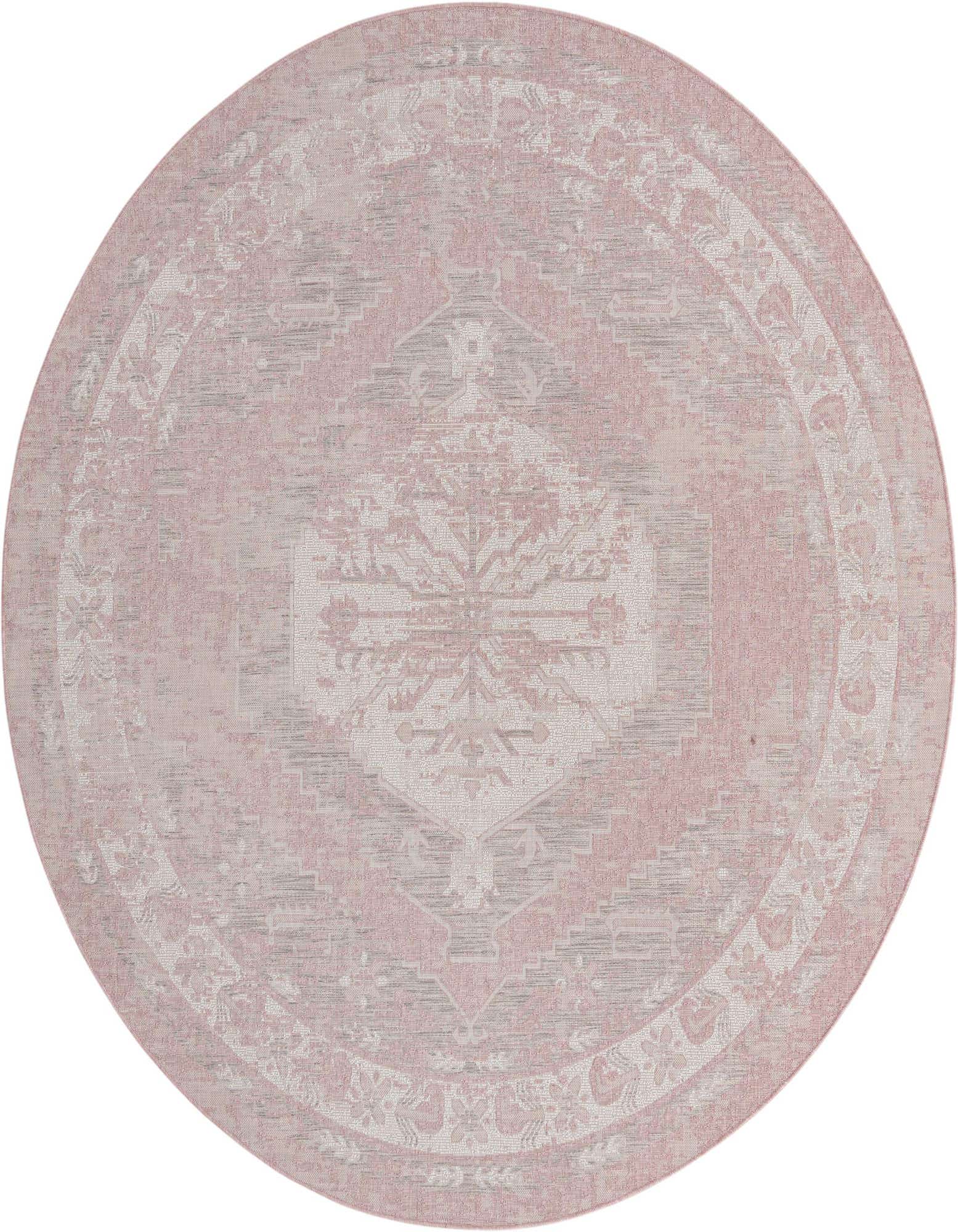 A large 13-foot round pink and gray Southwestern-style outdoor rug with a faded traditional medallion pattern.