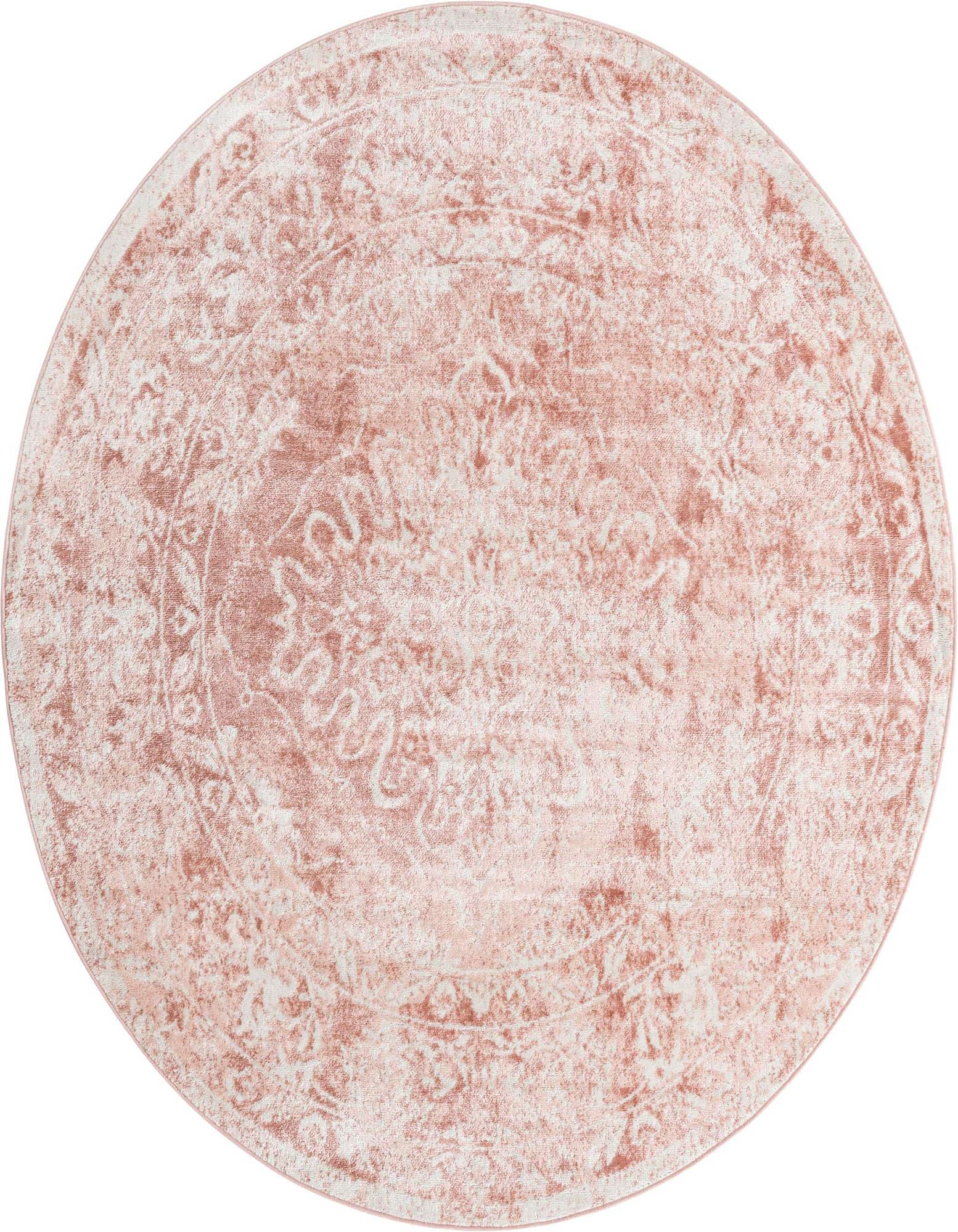A 7' round pink and white traditional medallion rug with a distressed vintage look.
