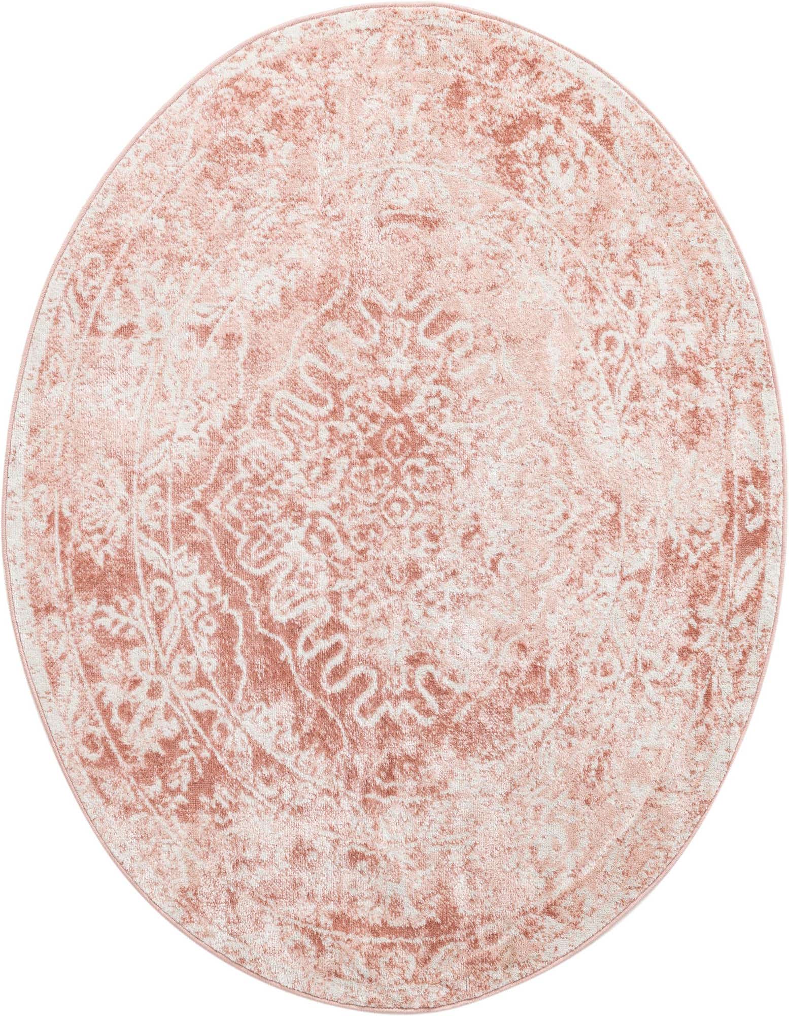 A 5' 3 round pink and white traditional medallion rug with a vintage, distressed look.