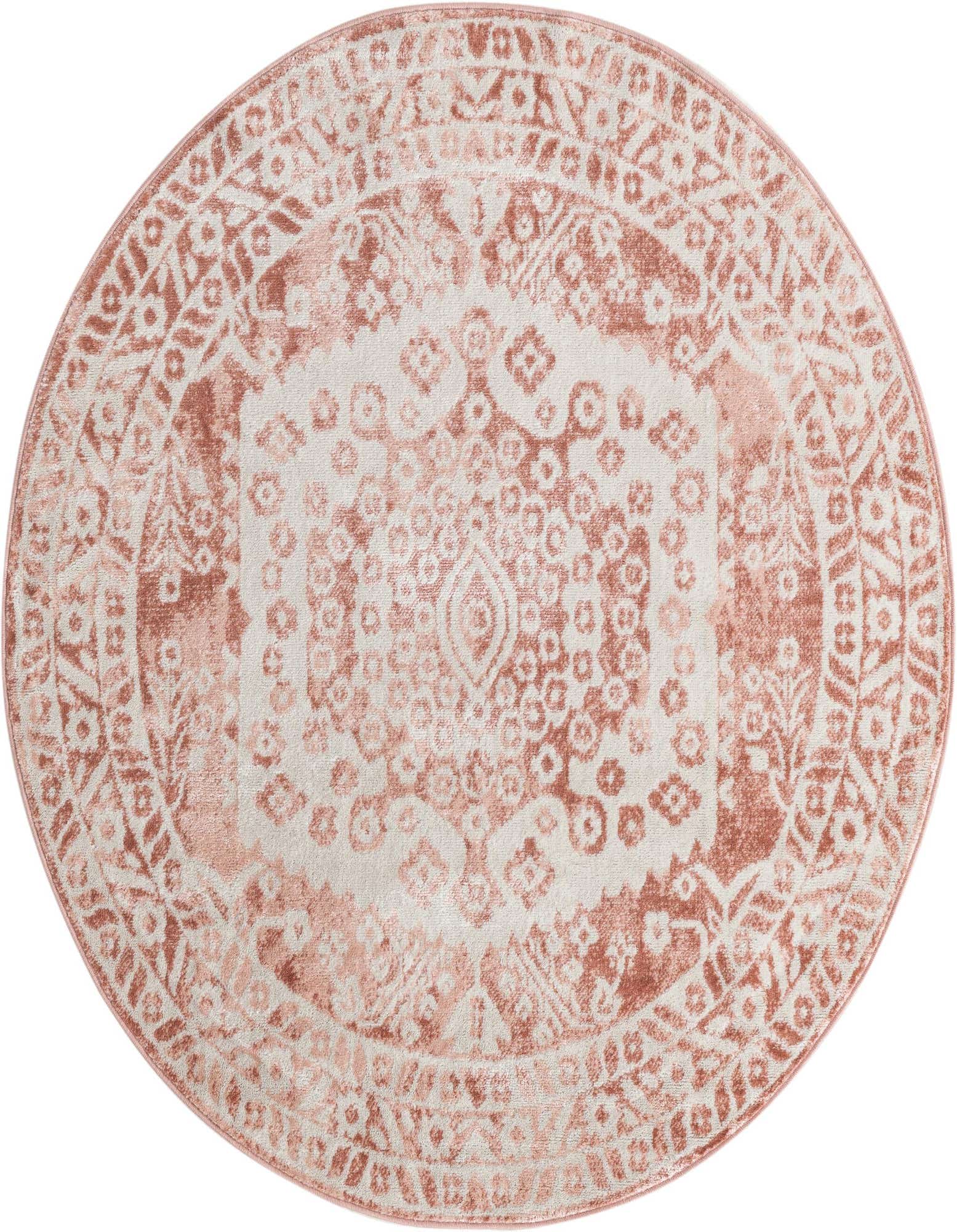 A 5' 0 x 5' 0 round pink bohemian rug with a distressed medallion pattern, ideal for an indoor living space.