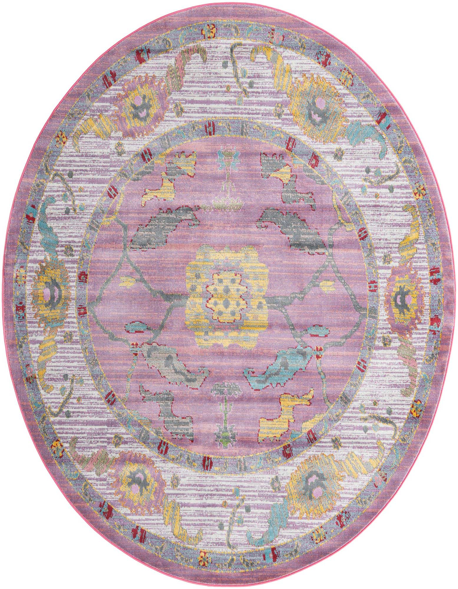 Round pink area rug with a vintage medallion pattern in yellow, teal, and gray, featuring a distressed look.