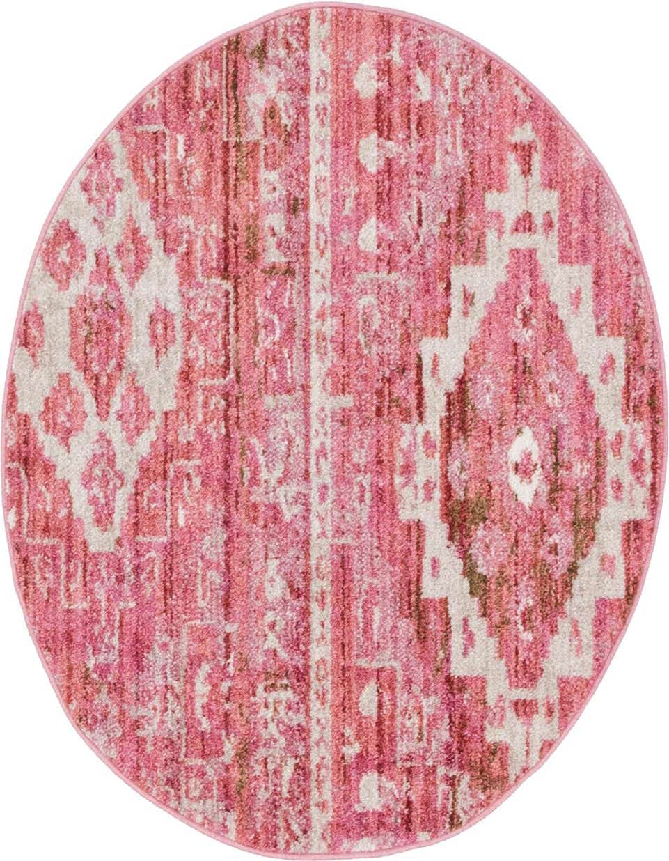 A 3' 3 x 3' 3 round pink rug with a distressed Southwestern and tribal pattern in varying shades of pink and cream.