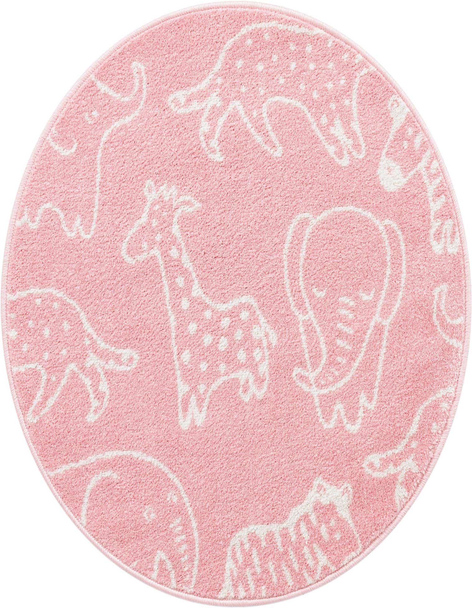 A round pink rug with white outlines of various safari animals like giraffes, elephants, and leopards, ideal for a child's room.