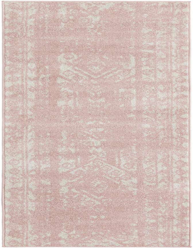 A long 8 ft pink runner rug with a faded cream Southwestern and tribal pattern, ideal for a hallway or kitchen.
