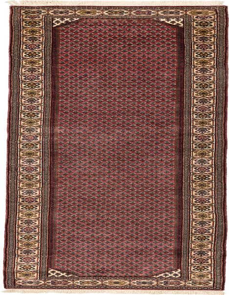 A handmade 11 ft runner rug in shades of pink with a traditional Oriental pattern and decorative border, suitable for a hallway.