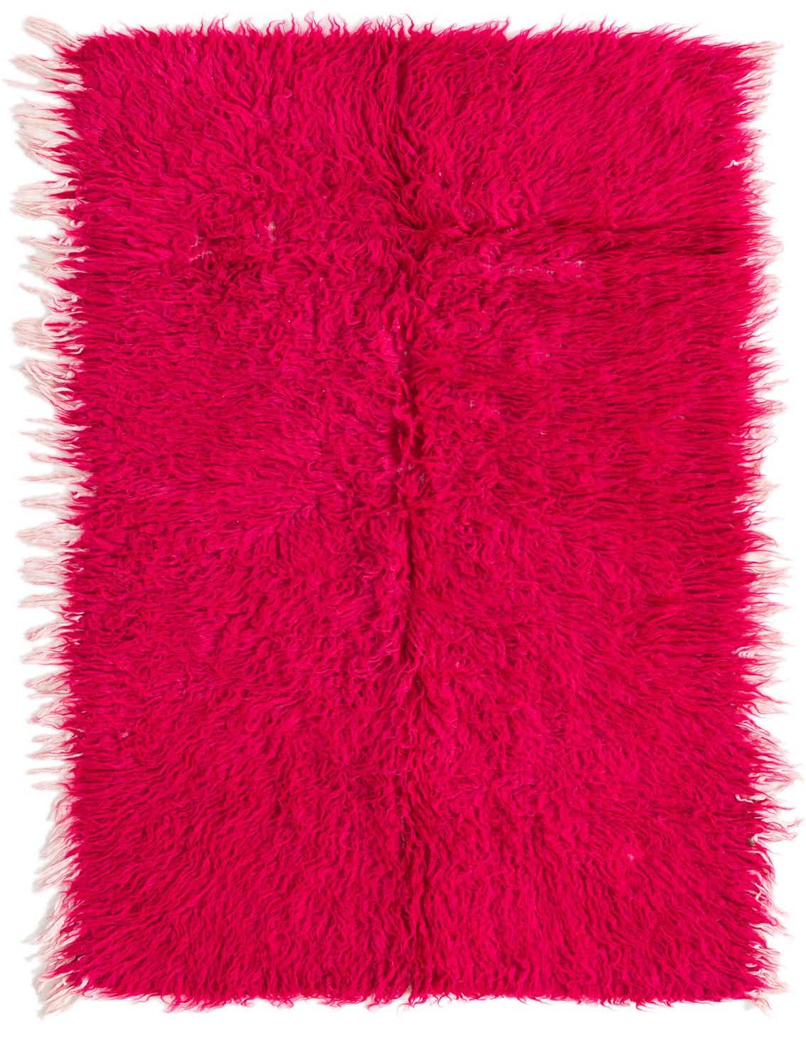 A vibrant pink shag runner rug with a tribal, modern, and oriental pattern, featuring soft, long pile and fringed edges, ideal for a hallway.