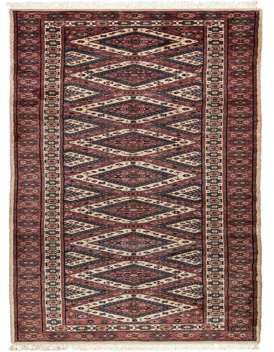 A long 11 ft runner rug with a traditional tribal pattern in shades of pink, cream, and dark blue, featuring diamond motifs and intricate borders.