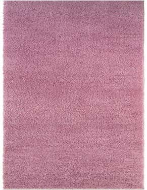 A soft, plush pink palace runner rug with a shag pile, perfect for adding warmth to a hallway.