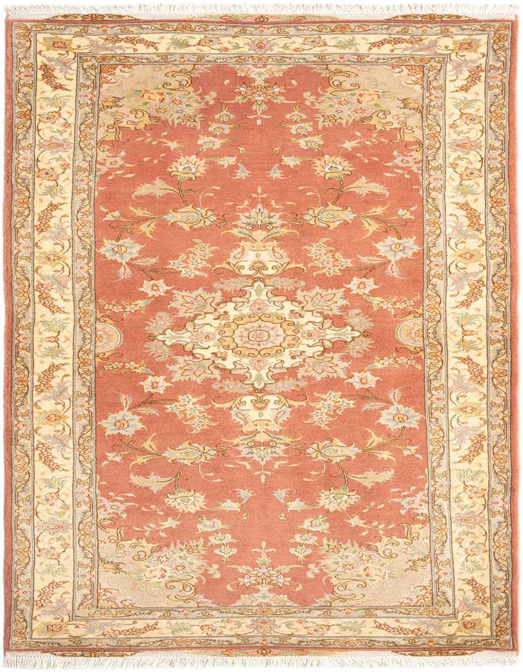 A 7 ft runner rug in a traditional Persian style, featuring a pink field with an intricate floral medallion and a cream border.