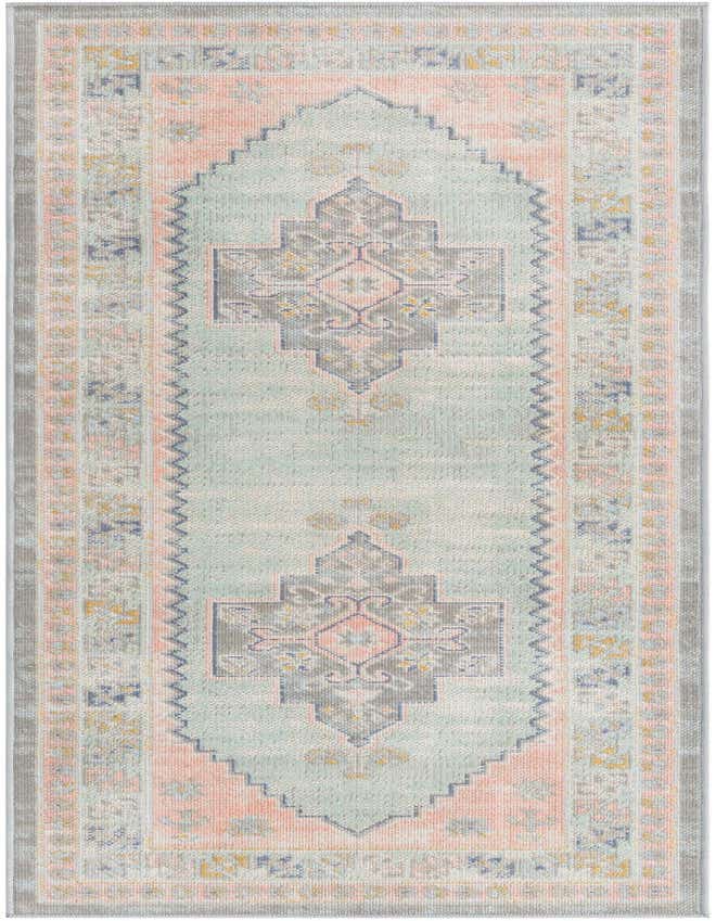 A 6 ft runner rug featuring a distressed tribal medallion pattern in soft pink, mint green, and gray tones, ideal for a hallway.
