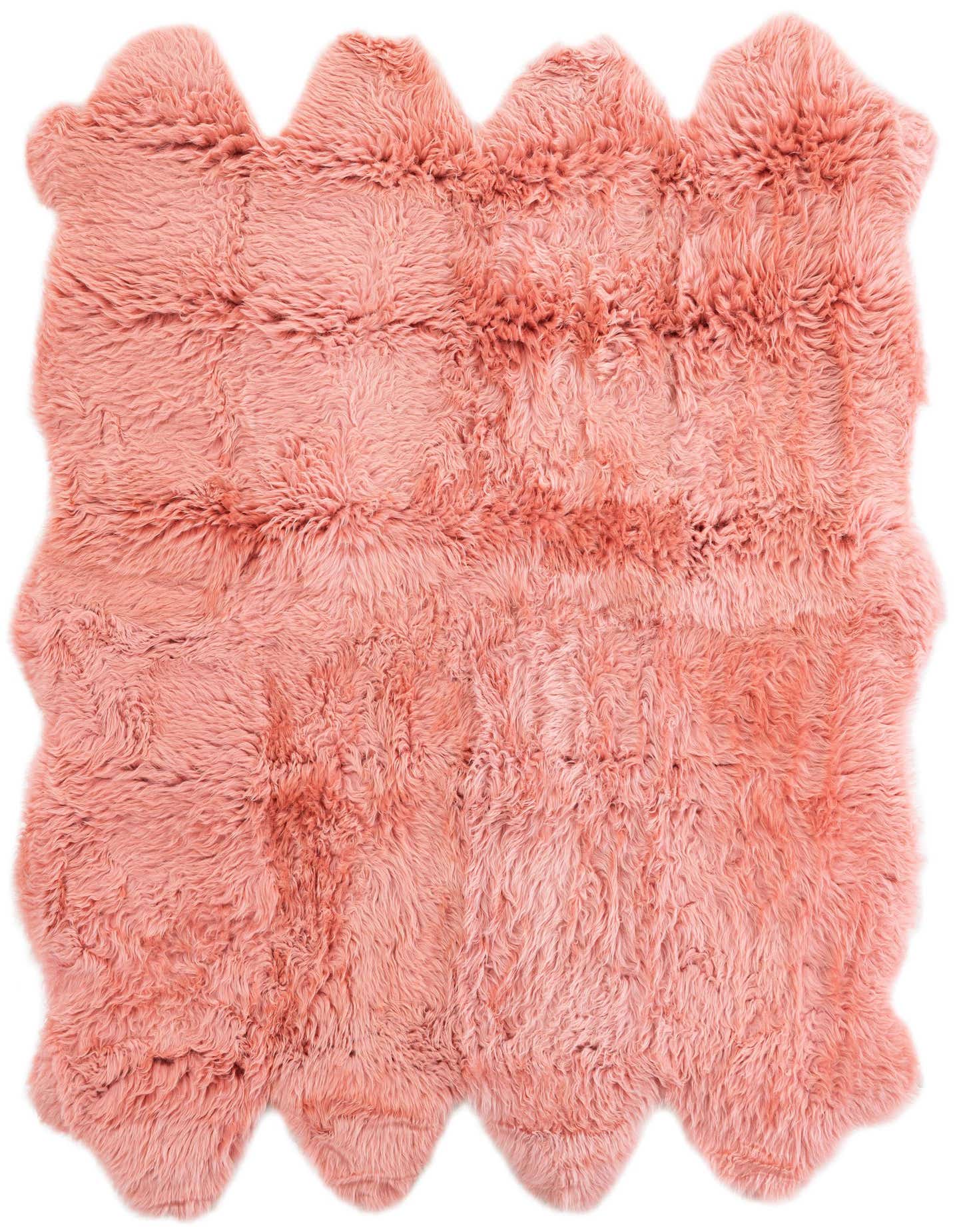 A luxurious 6x6 square pink lambskin rug with a wavy, organic edge and plush, textured pile.