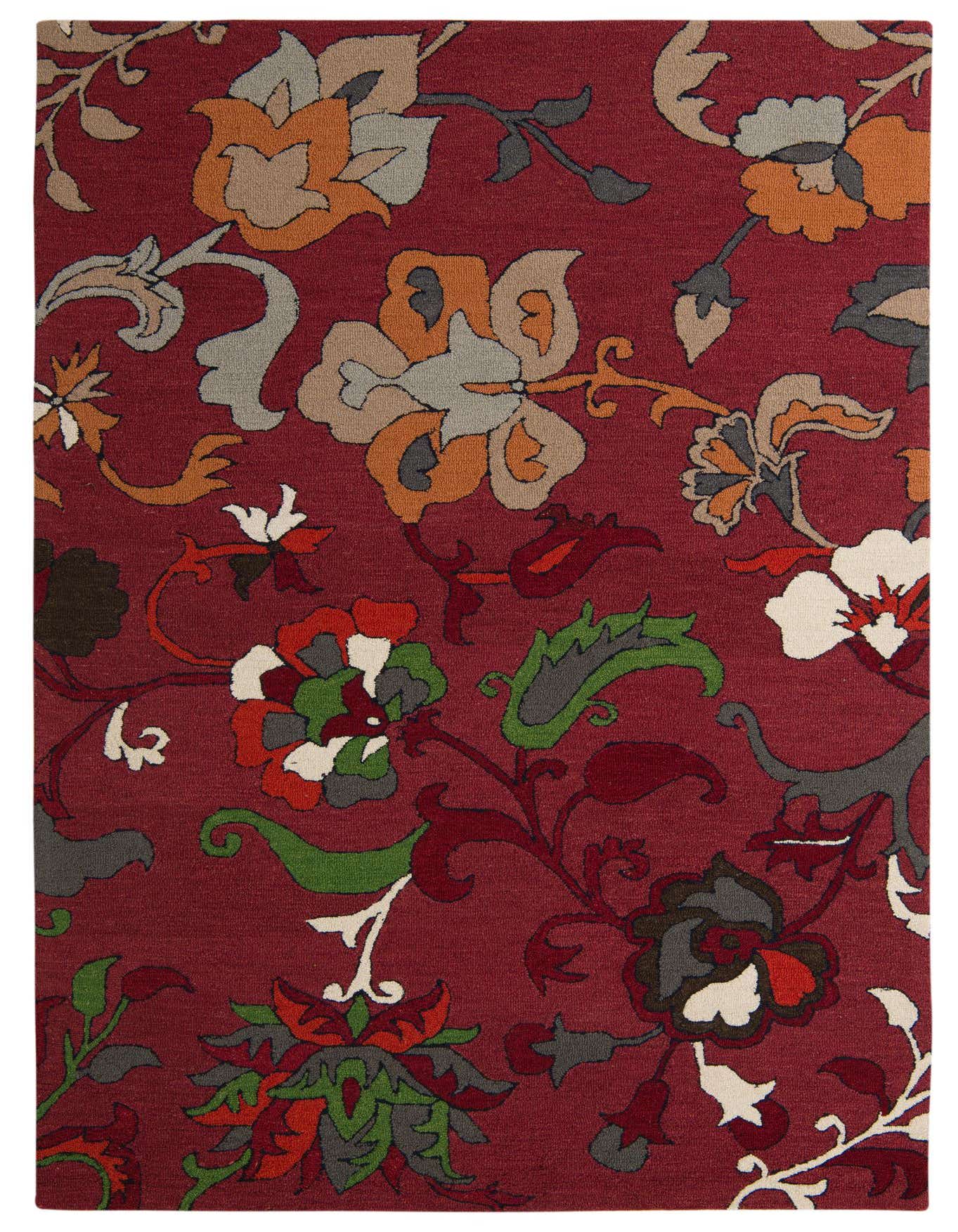A 6x9 rectangular wool and cotton rug featuring a deep red background with large, colorful floral and vine patterns in shades of purple, orange, green, and white.