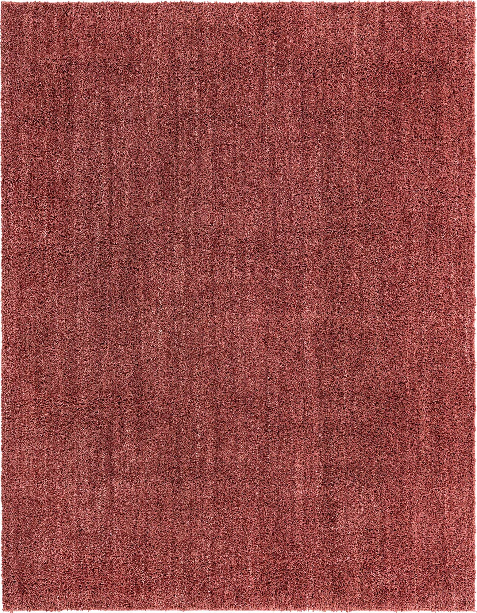 A soft, plush 7' 10" x 7' 10" square shag rug in a rich, solid red color, perfect for adding warmth to any indoor space.