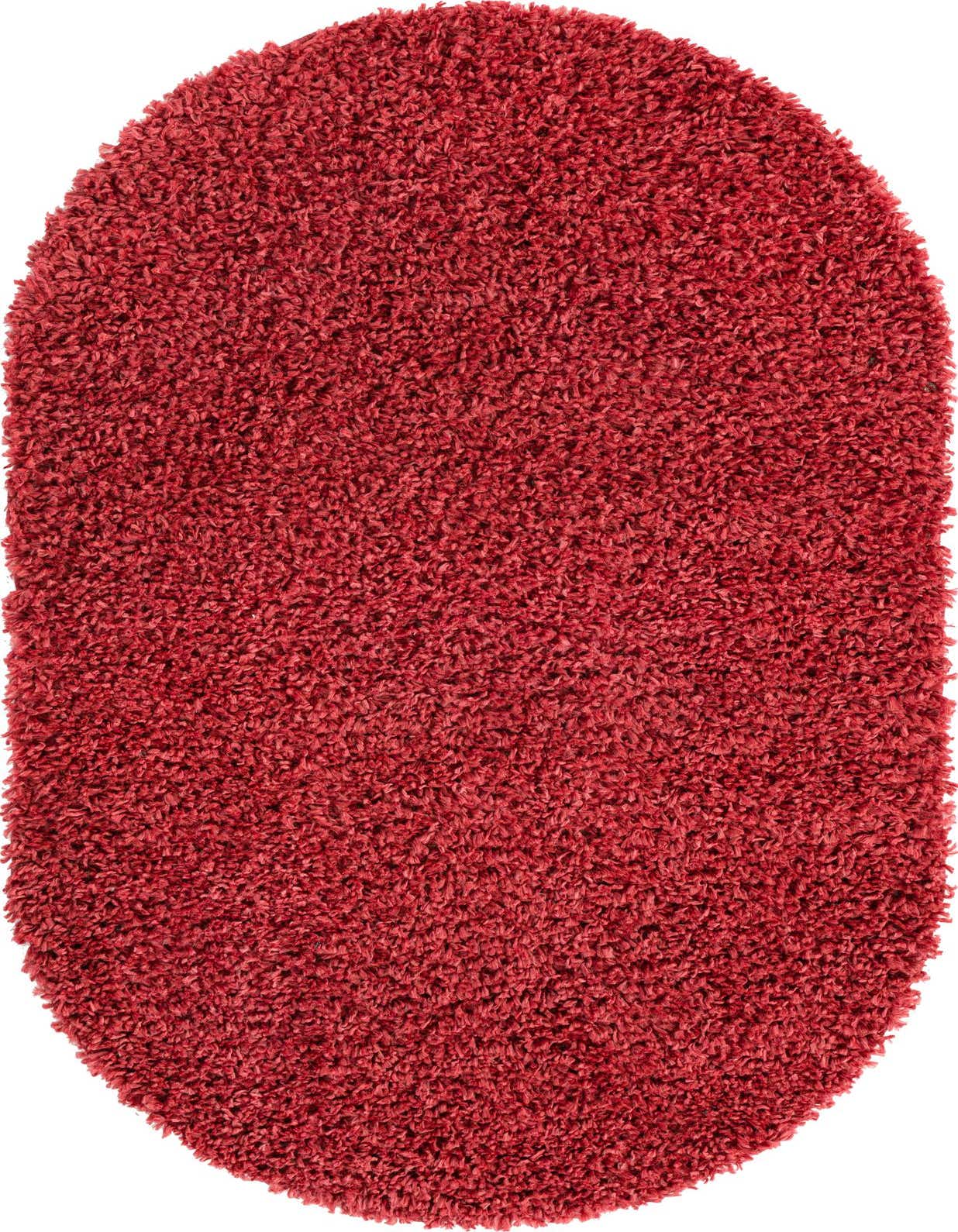 A plush, oval-shaped Zermatt Shag rug in a rich red color, featuring a deep, textured pile.