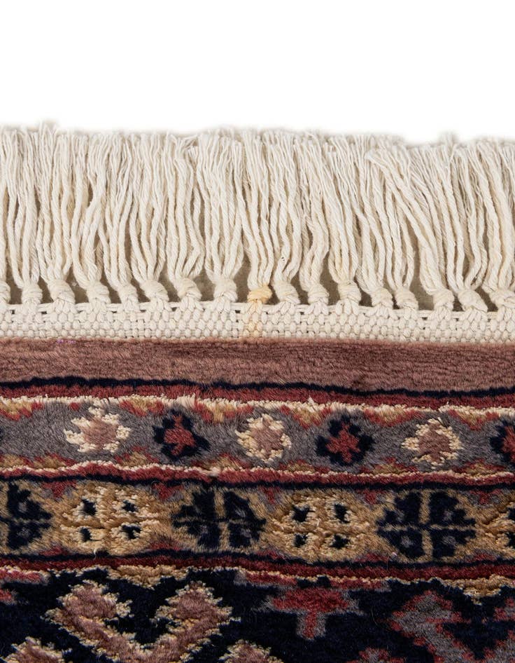 Detail image of  4' 3 x 5' 8  Hand Knotted Bokhara Oriental Rug