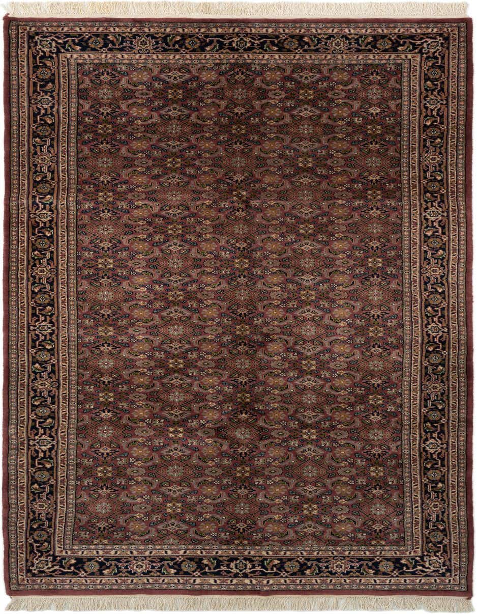 A 10 ft runner rug in traditional Oriental style, featuring a deep purple field with intricate floral patterns and a dark border, suitable for a hallway.