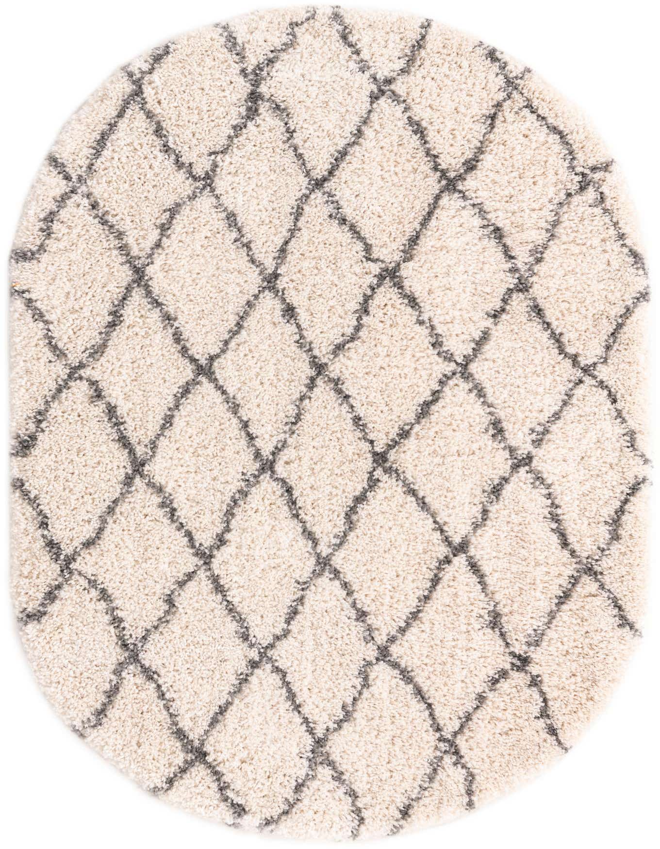 An oval ivory shag rug with a gray trellis pattern, showcasing its soft, textured pile.