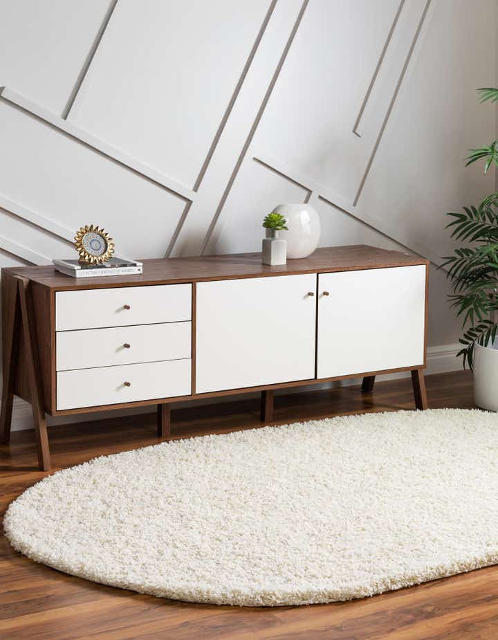 Pure Ivory 5' x 8' Solid Shag Oval Rug | Rugs.com
