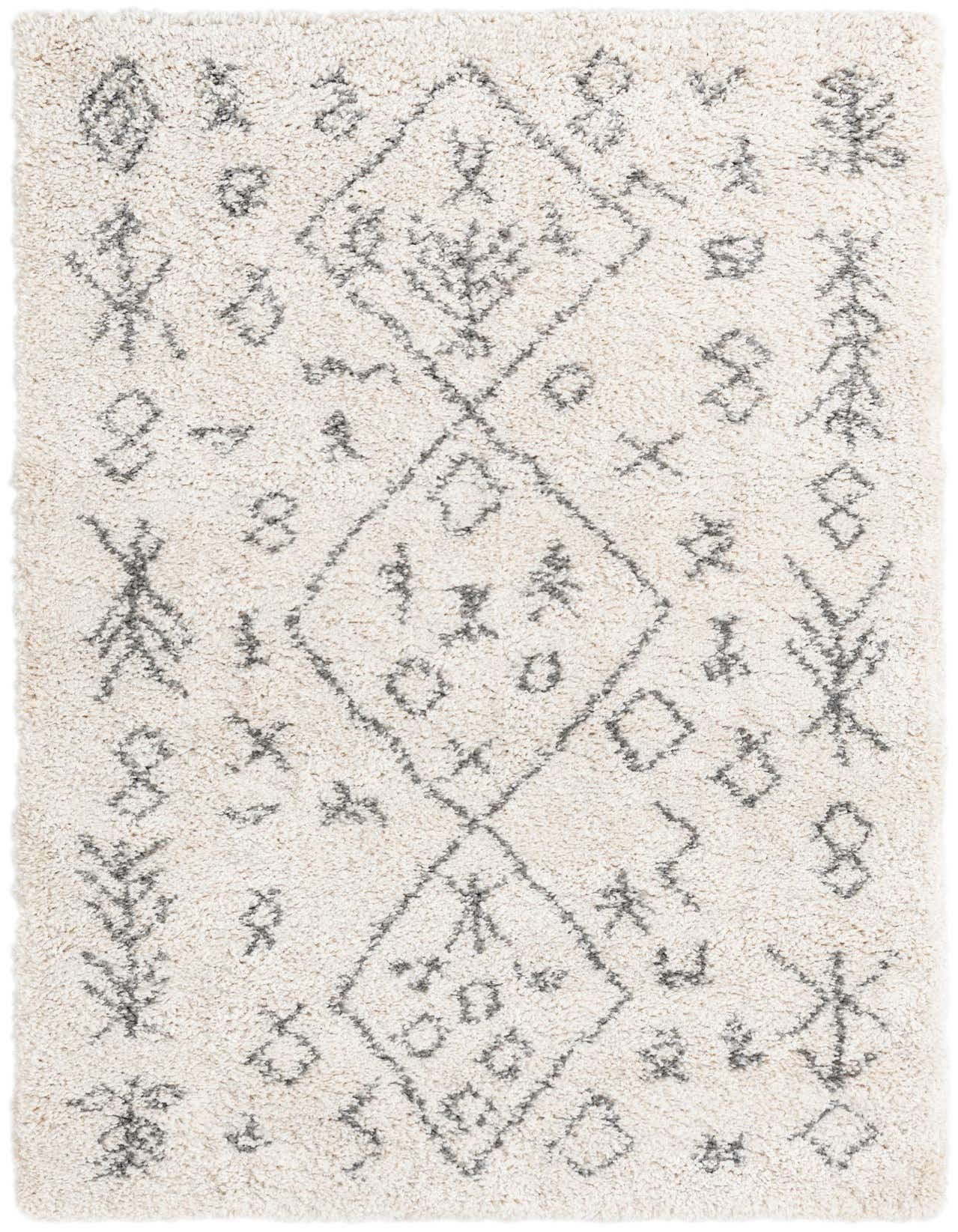 A 5x8 rectangular ivory shag rug featuring a modern tribal pattern of abstract charcoal gray symbols and diamonds.