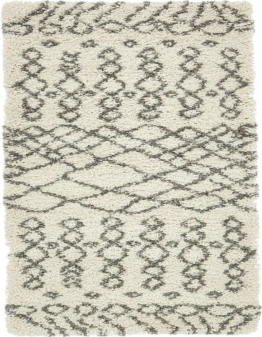 A 5 ft runner rug in ivory and cream with a textured shag pile and a modern tribal trellis pattern in gray.