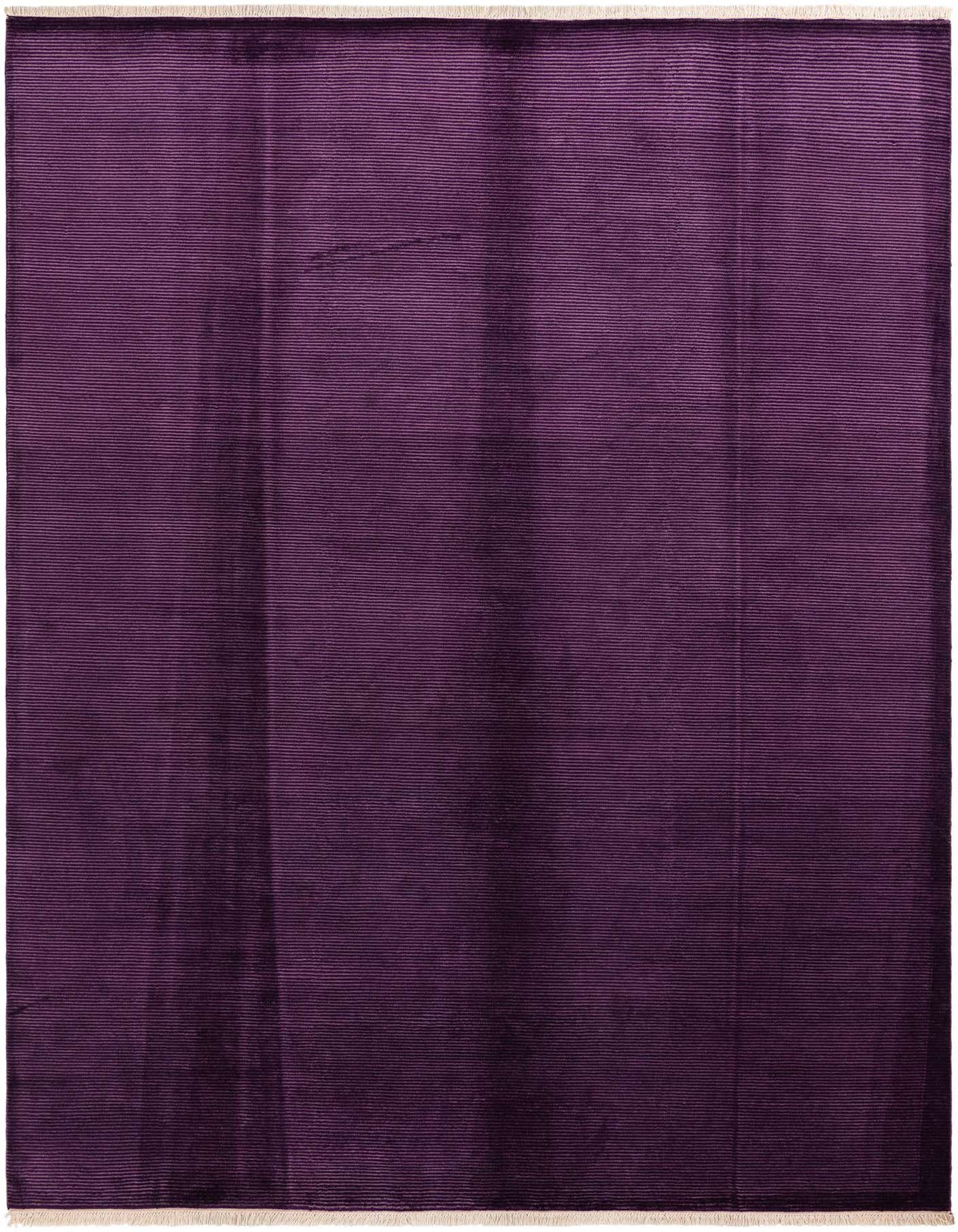 A large 8x11 rectangular Darya rug in deep purple wool with subtle horizontal ribbing and short white fringe.