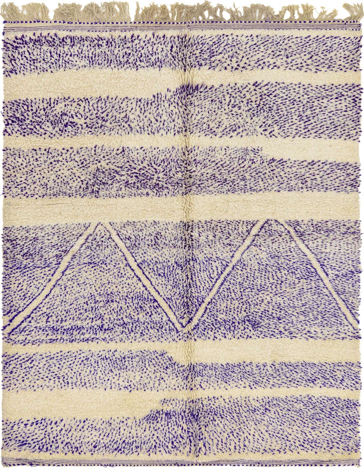 A 6x9 rectangular purple and cream shag rug with tribal geometric patterns and tassels, ideal for a living room.