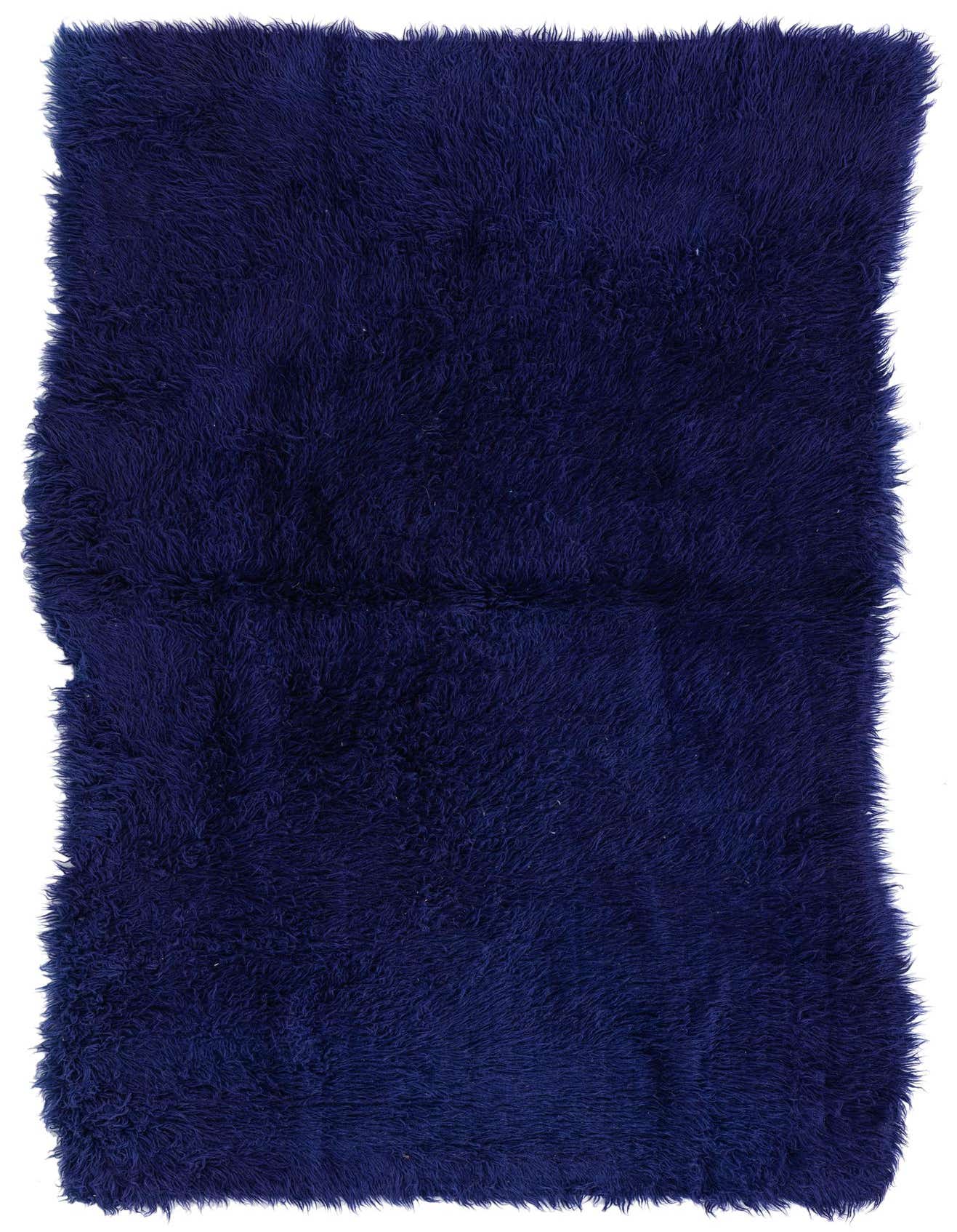 A rectangular 5x8 purple shag rug, handmade from wool, featuring a plush texture ideal for a living room or bedroom.