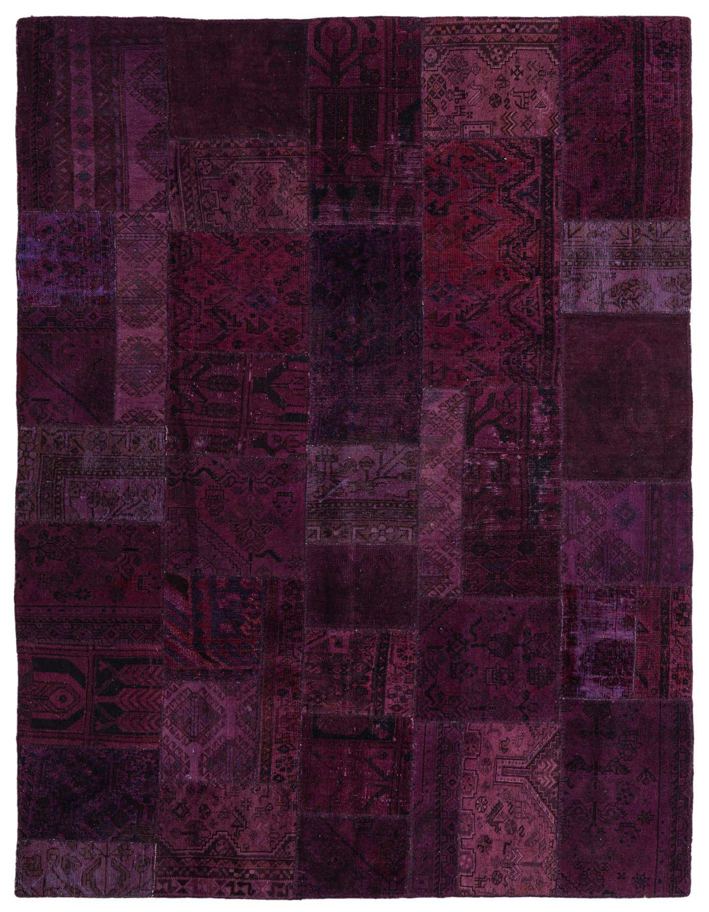 A 7x10 rectangular Ultra Vintage rug featuring a patchwork of various purple and magenta Persian, Oriental, and abstract patterns.