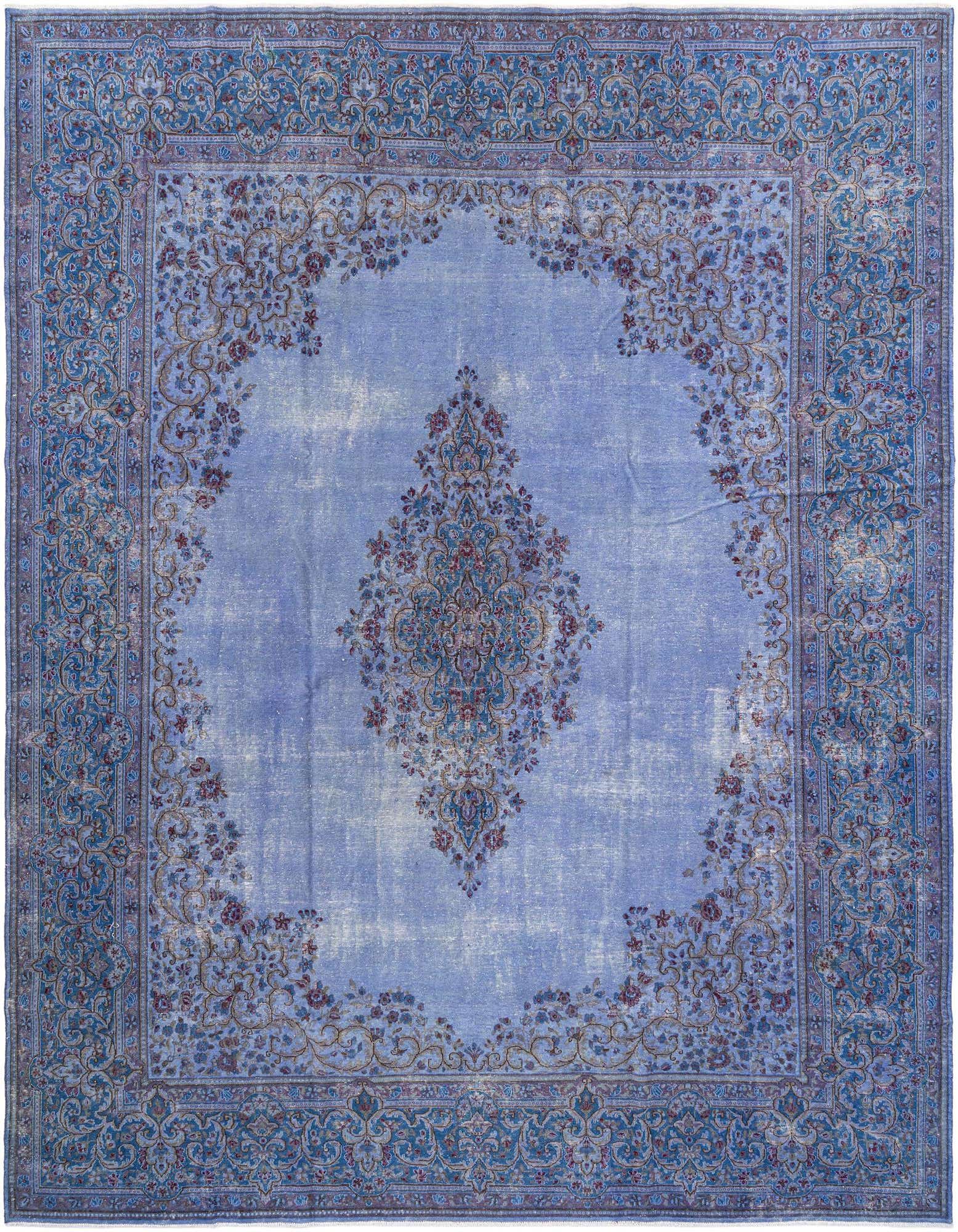 An 8x11 rectangular purple wool rug with a faded traditional medallion and floral border design.