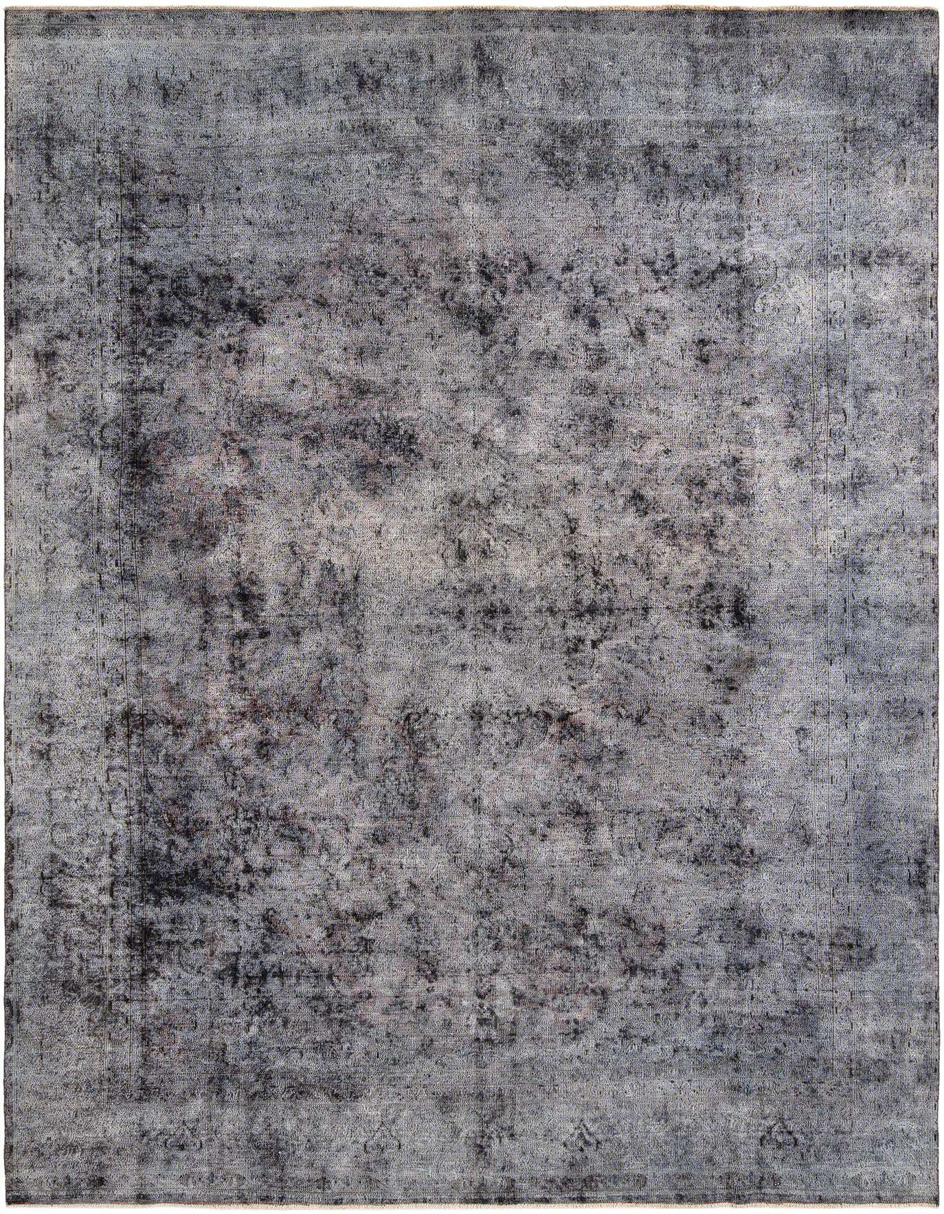 A 9x12 rectangular Rugs.com Vintage Persian rug in varying shades of purple and grey, featuring a distressed, traditional pattern.