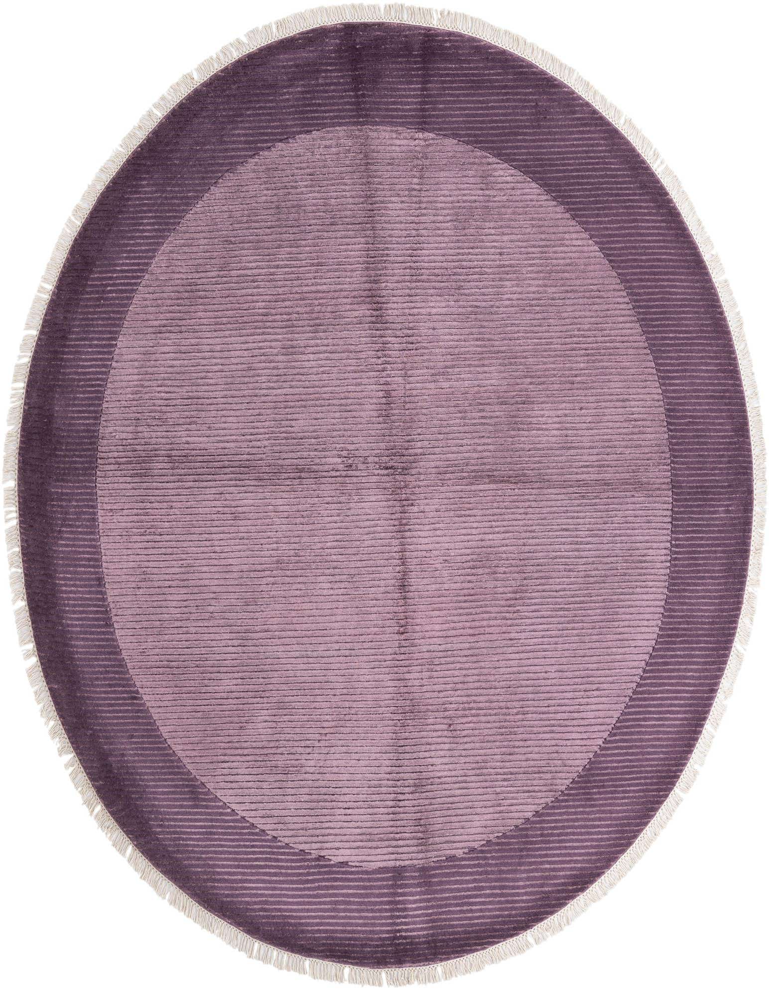 A round, handmade Darya rug with a high pile in varying shades of purple, featuring a modern striped pattern and white fringe.