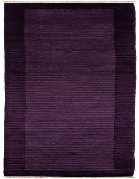 A 13 ft Darya runner rug in varying shades of deep purple with a modern striped pattern, handmade from wool and cotton.