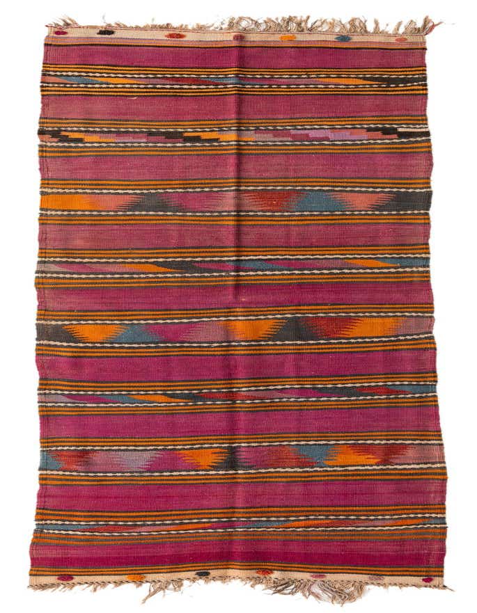 A 12 ft runner rug in shades of purple with tribal patterns, orange, blue, and black accents, and fringed ends.