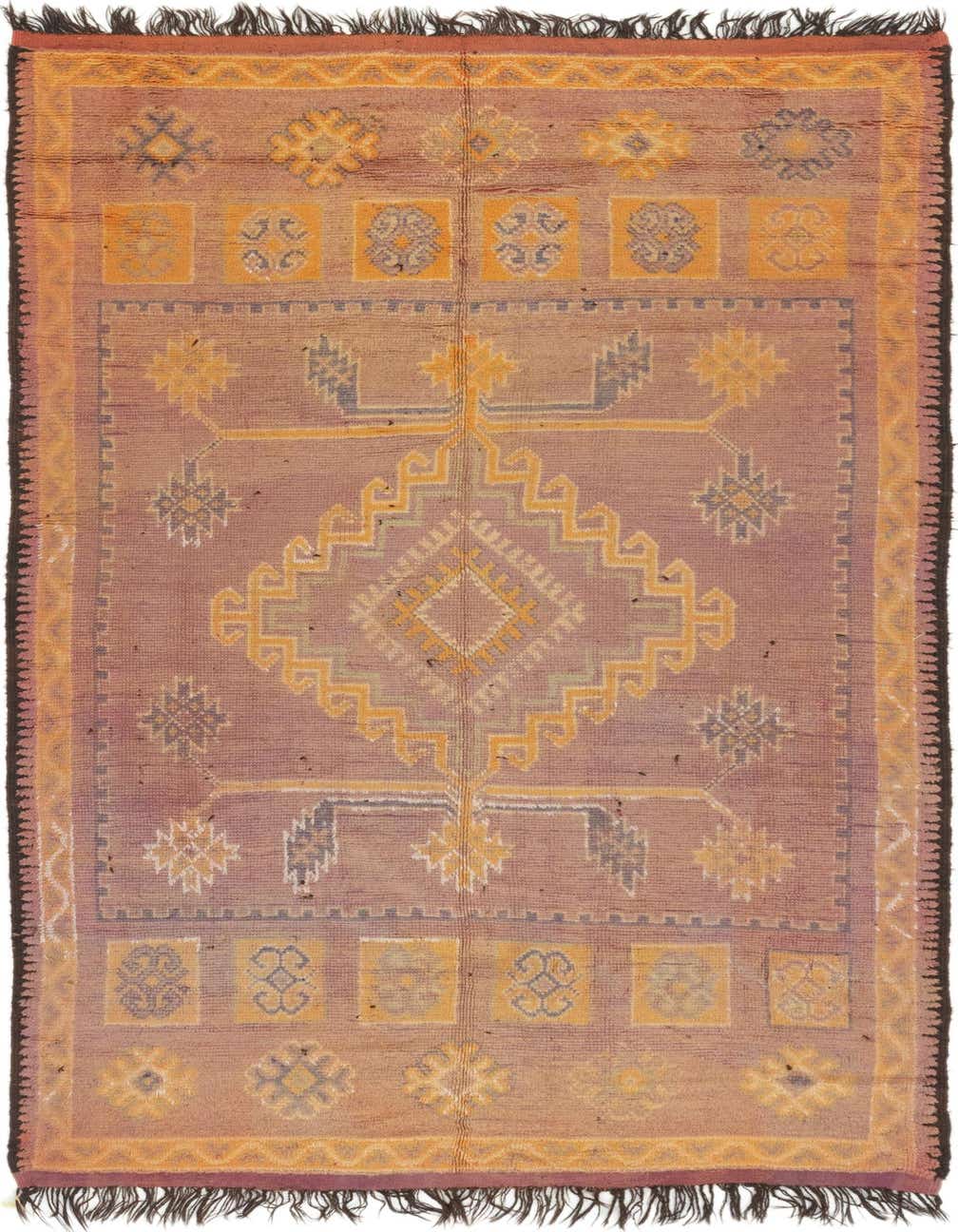 A 12 ft runner rug in purple and orange, featuring a central medallion and tribal patterns, with fringed ends.