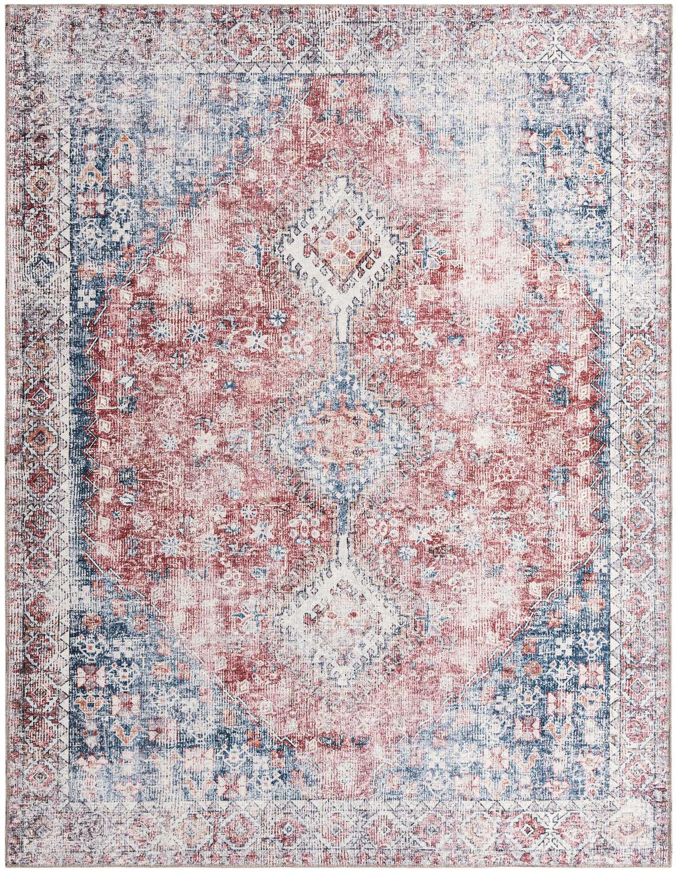A 6x9 rectangular area rug featuring a distressed traditional pattern in shades of red, navy blue, and white.