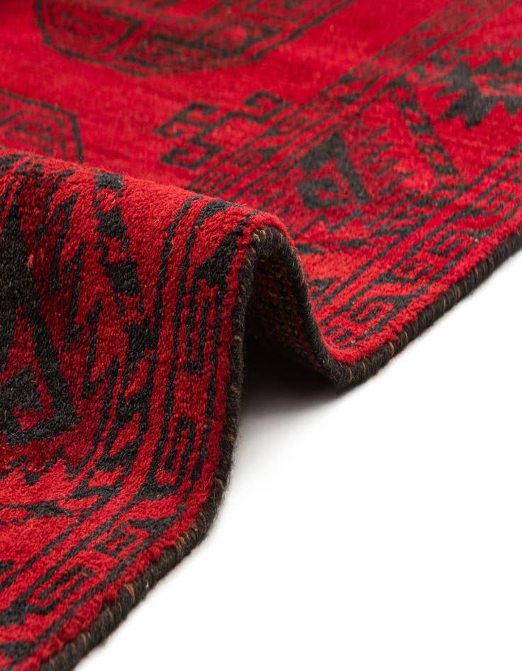 Detail image of  3' 4 x 5' 10  Hand Knotted Afghan Akhche Wool Rug