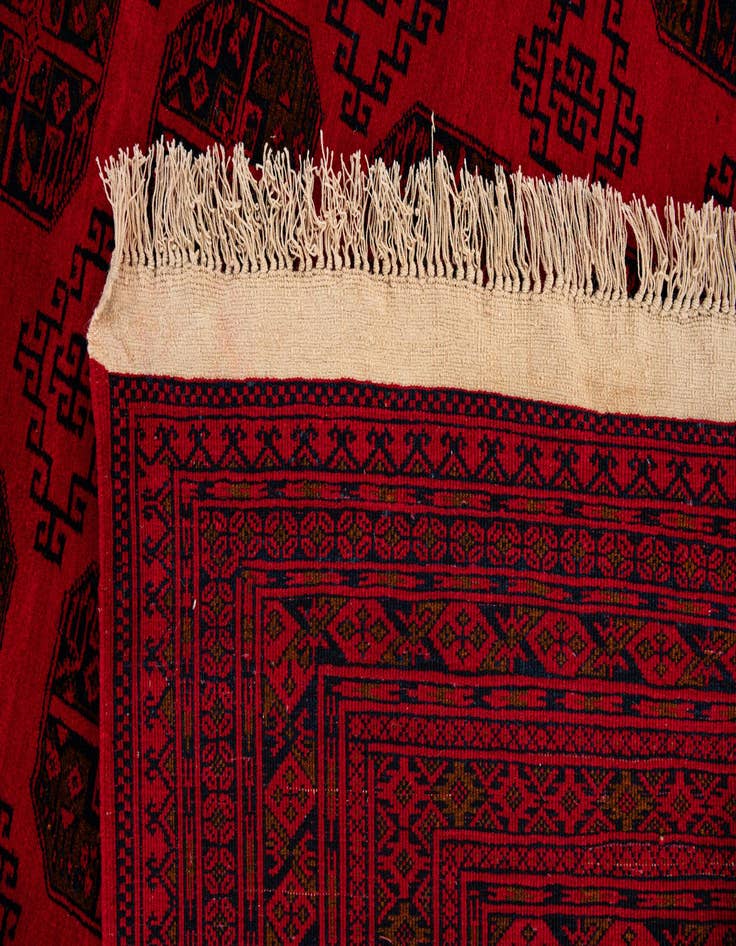 Detail image of  6' 6 x 10'  Hand Knotted Afghan Akhche Wool Rug