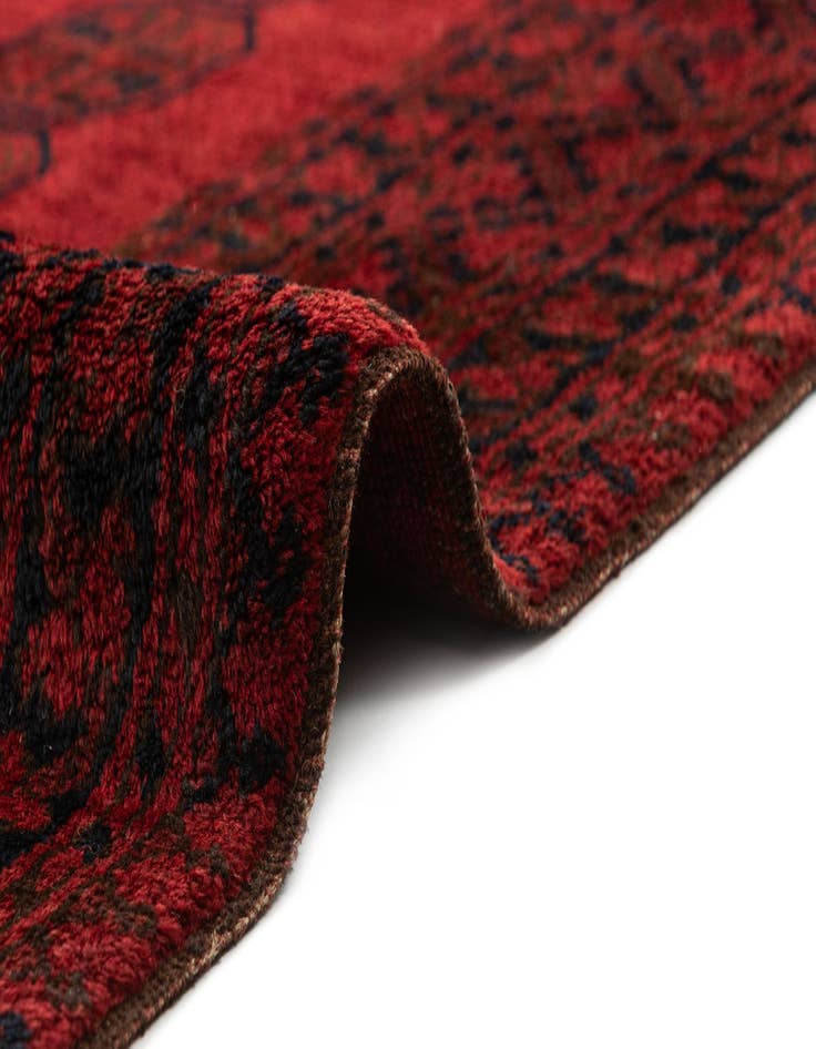 Detail image of  5' x 8'  Hand Knotted Afghan Akhche Wool Rug