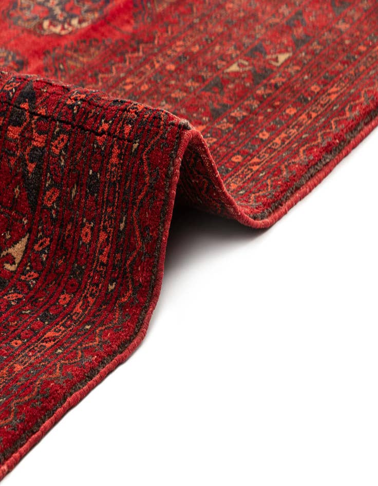 Detail image of  7' x 9' 6  Hand Knotted Afghan Akhche Wool Rug