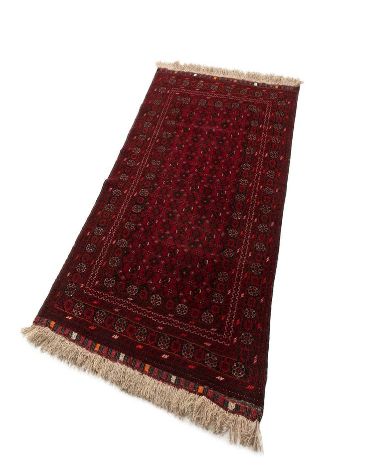 Detail image of  4' 3 x 6' 9  Hand Knotted Afghan Akhche Wool Rug