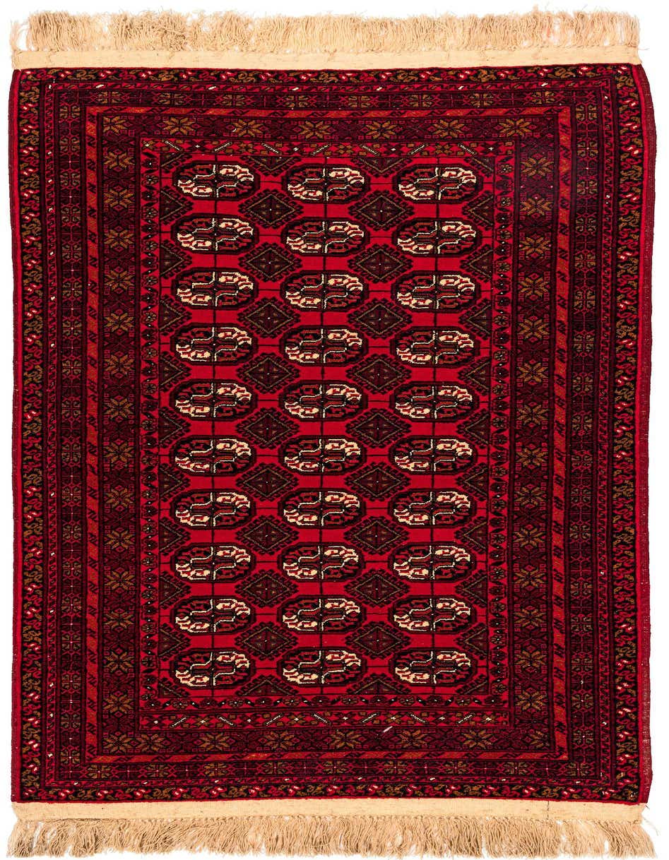 A 4x6 rectangular red tribal rug with a repeated pattern of dark and light geometric medallions, finished with natural fringe.