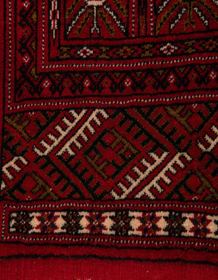Detail image of  4' 3 x 6' 6  Hand Knotted Afghan Akhche Wool Rug
