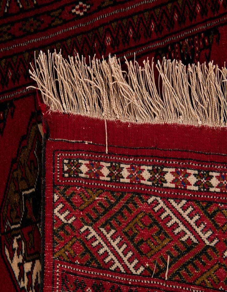Detail image of  4' 3 x 6' 6  Hand Knotted Afghan Akhche Wool Rug